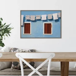 23" X 16" Hanging Laundry Along Wall By Brenda Tharp Danita Delimont Framed Canvas Wall Art Blue - Amanti Art -Amanti Art GUEST 21ee6bf8 104c 4610 a236 ef29e16bab9c